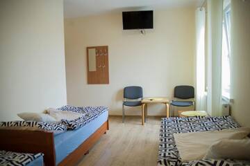 Фото номера Двухместный номер с 1 кроватью Апарт-отели Pod Kogucikiem г. Krzyżanowice 4