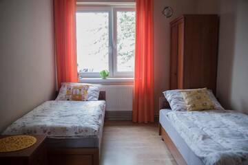 Фото номера Двухместный номер с 1 кроватью Апарт-отели Pod Kogucikiem г. Krzyżanowice 9